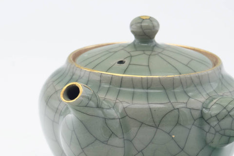Tezumi — Japanese Kyusu - Golden Horse Green Celadon Glazed Obori Soma-yaki Porcelain Teapot - 200ml — closeup of the decoration