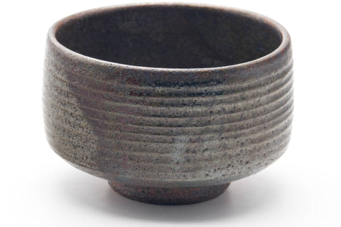 Tezumi — Japanese Matcha Bowl - Earthy Milky Glazed Spiraling Chawan - 300ml — tipped to show the interior