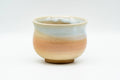 Japanese Teacup - Tsubaki Kiln Beige White Glazed Hagi-yaki Yunomi - 140ml - side view of the cup