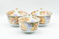 Japanese Tea Set - Floral Arita-yaki Dobin Teapot with 3 Lidded Yunomi Teacups - three matching lidded teacups grouped
