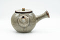 Japanese Tea Set - Tanuki Raccoon Dog Kyusu and Yunomi - side view of the teapot showing the side handle