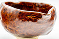 Close-up interior view of the dark glossy glaze pooling inside the katakuchi