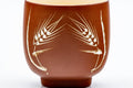 Tezumi — Japanese Teacup - Yellow Wheat Glazed Tokoname-yaki Yunomi - 130ml — tipped to show the interior