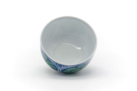 Overhead view into the open teacup showing the white interior and blue rim line.