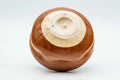 Inverted view of the aka-raku chawan showing the foot and underside