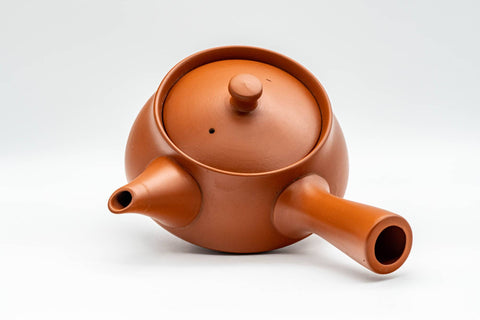 Japanese Tea Set - Long Grass Engraved Tokoname-yaki Debeso Kyusu Teapot with 5 Yunomi Teacups - high-angle view of the teapot showing the lid knob and spout