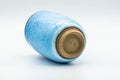 Japanese Teacup - Sky Blue Shino Glazed Yunomi - 275ml - tilted view showing the foot and base
