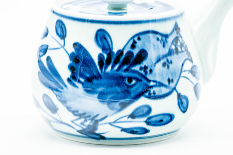 Japanese Kyusu - Blue Floral Arita-yaki Ceramic Filter Teapot - 400ml - side view showing the blue floral decoration on the white body