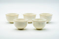 Japanese Teacups - Set of 5 Kozan Kiln Purple Floral Mino-yaki Porcelain Yunomi - the five cups clustered front-on showing their white glazed bodies