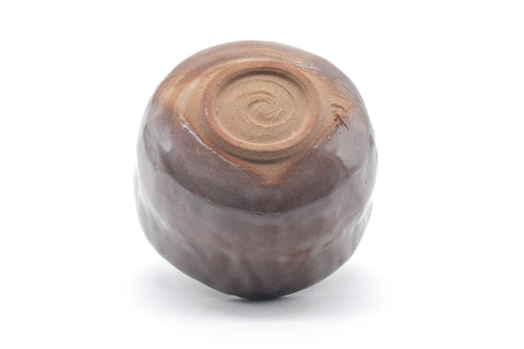 Mino-yaki chawan inverted to show the underside and spiral-trimmed foot ring (kodai)