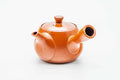 Red shudei Tokoname kyusu, three-quarter view from the rear with the handle to the right