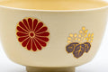 Tezumi — Japanese Matcha Bowl - Beige Floral Kyo-yaki Hantsutsu-gata Chawan - 300ml — tipped to show the interior