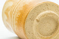 Close-up of the unglazed foot showing concentric throwing rings.