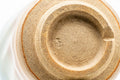 Tezumi — Japanese Teacup - Carved Beige Peach Glazed Hagi-yaki Yunomi - 200ml — inverted showing the foot ring