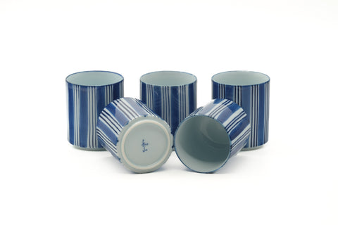 Tezumi — Japanese Tea Set - Blue White Arita Porcelain Kyusu Teapot with 5 Yunomi Teacups — the cups viewed from above