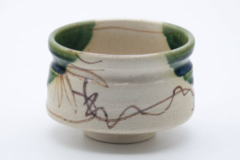 Tezumi — Japanese Matcha Bowl - Floral Beige Green Glazed Oribe-yaki Chawan - 250ml — inverted showing the foot ring