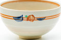 Close-up of one cup showing the orange stripe bands and a small painted motif.