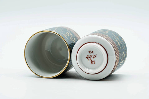 The cups with lids off, showing the interiors and the undersides of the lids.