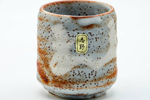 Tezumi — Japanese Teacups - Pair of Blue Orange Shino-Glazed Meoto Yunomi — tipped to show the interior