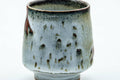 Tezumi — Japanese Teacup - Milky White Drip-Glazed Yunomi - 120ml — tipped to show the interior