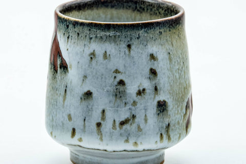 Tezumi — Japanese Teacup - Milky White Drip-Glazed Yunomi - 120ml — tipped to show the interior