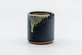 Tezumi — Japanese Teacup - Black Beige Drip-Glazed Ushirode Yunomi - 100ml — three-quarter view
