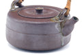 Tezumi — Japanese Dobin - Top-Handled Ceramic Teapot - 310ml — side profile showing the spout and handle