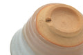 Tezumi — Japanese Teacup - Beige White Glazed Asagao Hagi Yunomi - 110ml — inverted showing the foot ring
