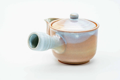 Pink-beige drip-glazed Hagi-yaki kyusu, front view with the spout facing forward