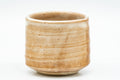 Tezumi — Japanese Teacup - Beige Drip-Glazed Hagi-yaki Yunomi - 70ml — inverted showing the foot ring