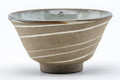 Tezumi — Japanese Teacup - Brown Spiraling Sage Interior Glazed Yunomi - 100ml — tipped to show the interior