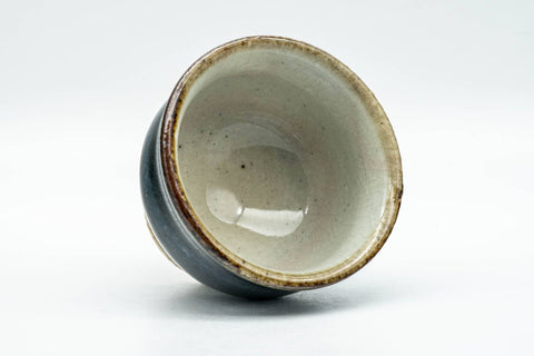 Tezumi — Japanese Teacup - Black Blue Glazed Exterior Beige Interior Yunomi - 70ml — three-quarter view