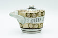 Japanese Tea Set - Gold White Chrysanthemum Kutani-yaki Kyusu Teapot with 2 Yunomi Teacups - side profile showing the spout and handle