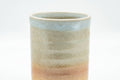 Tezumi — Japanese Teacup - Beige White Glazed Tsutsu-gata Hagi-yaki Yunomi - 140ml — tipped to show the interior