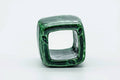 Angled view of the square ring opening of the lid rest.