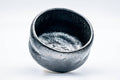Overhead view into the bowl's black-glazed interior well