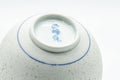 Tezumi — Japanese Teacup - White and Blue Floral Arita-yaki Yunomi - 140ml — inverted showing the foot ring
