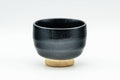 Japanese Teacup - Tenmoku Glazed Guinomi - 75ml - front view of the black tenmoku glazed cup with unglazed foot