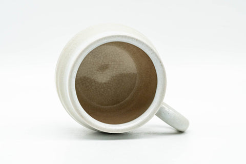 Tezumi — Japanese Teacup - Small Beige and White Hagi-yaki Ushirode Yunomi - 90ml — three-quarter view