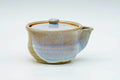The handleless houhin teapot, lid on, front view.