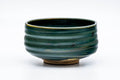 Tezumi — Japanese Matcha Bowl - Green Glazed Thumb-Indented Spiraling Chawan - 200ml — three-quarter view