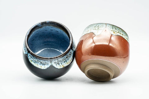Tezumi — Japanese Teacups - Pair of Black and Red White Drip-Glazed Yunomi - 110ml — three-quarter view