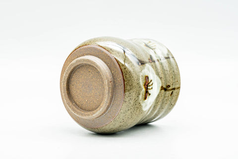 Underside view of the yunomi showing the unglazed foot ring and base.