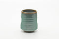 Tezumi — Japanese Teacup - Teal Speckled Thumb-Indented Yunomi - 180ml — three-quarter view
