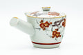 Opposite-side view of the kyusu showing more of the floral Kutani decoration.
