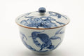 Tezumi — Japanese Teacup - Blue Bird Floral Arita-yaki Lidded Yunomi - 150ml — tipped to show the interior