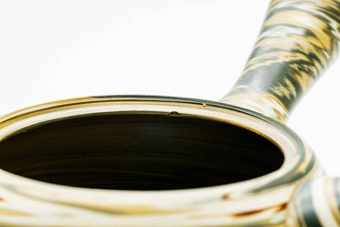 Looking into the open teapot interior with the lid off.