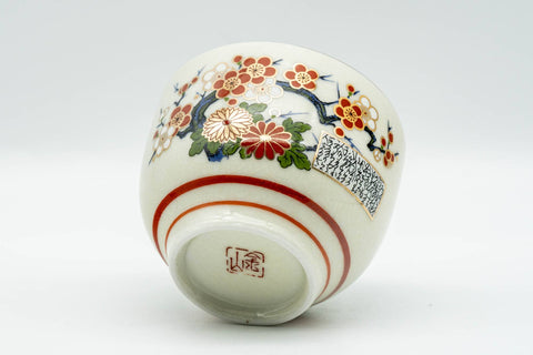 Japanese Teacup - Beige Red Chrysanthemums Kutani-yaki Yunomi - 130ml - tilted view showing footring and floral motif