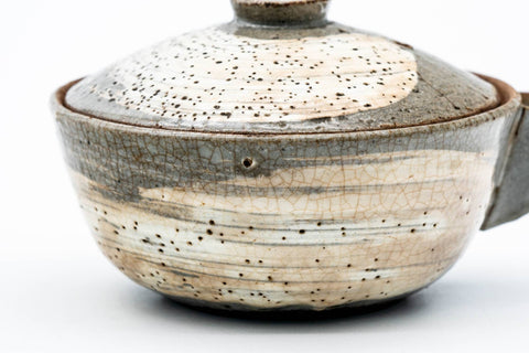 Tezumi — Japanese Houhin - Weathered Grey Hakeme Glazed Handleless Teapot - 140ml — closeup of the decoration