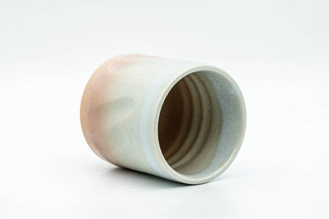 Tezumi — Japanese Teacup - Carved Beige Peach Glazed Hagi-yaki Yunomi - 200ml — three-quarter view